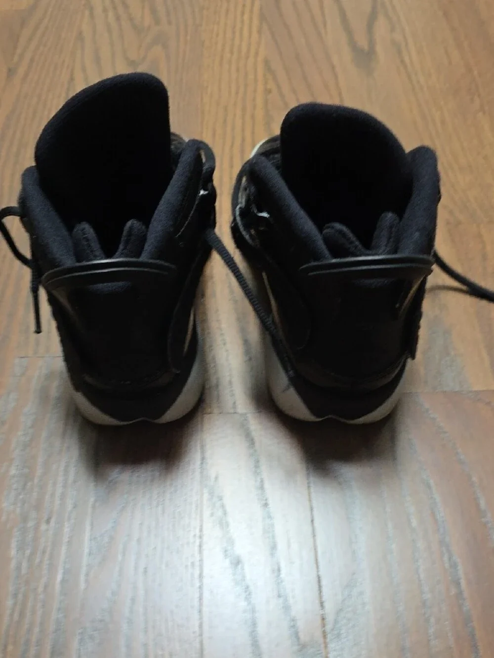 Jordan Black High-Top Patent Leather Sneakers